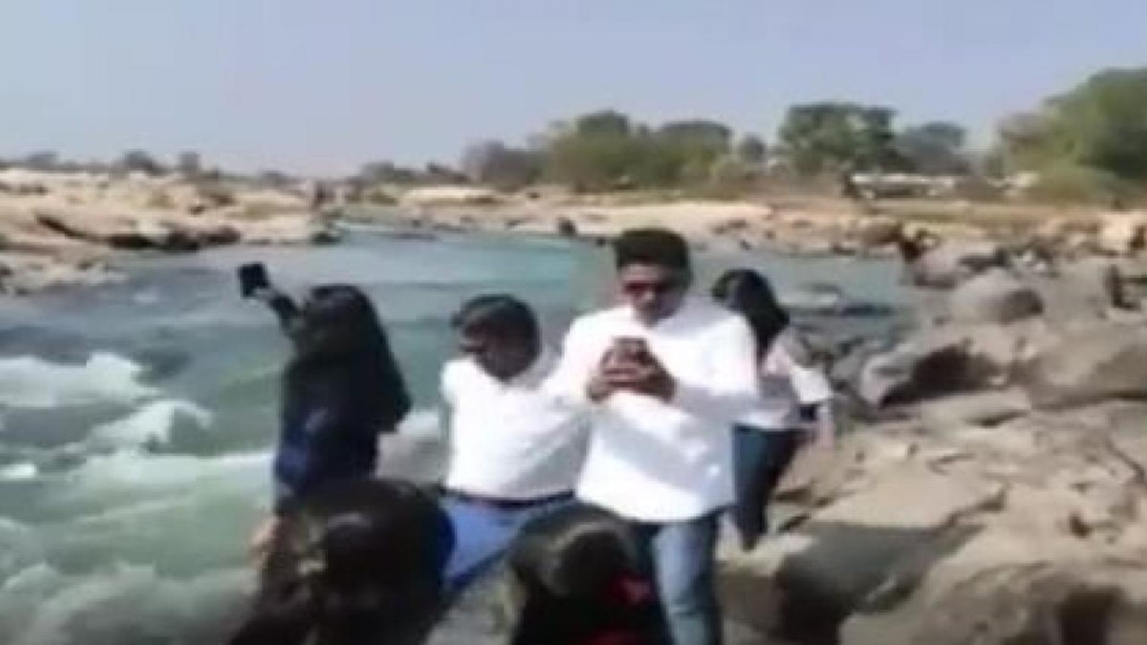 Woman dies after falling into river while taking selfie