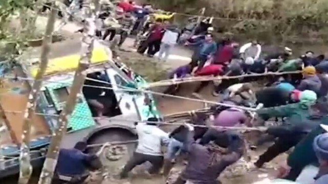 Image of the day: Villagers join hands to pull out a truck from 70 feet deep gorge in Nagaland