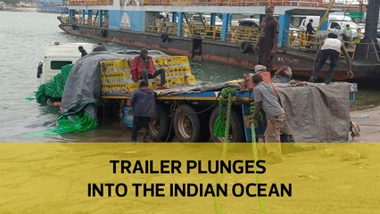 Trailer plunges into the Indian Ocean