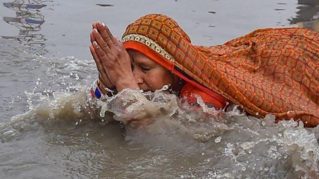 Devotees take dip in holy river Ganga on Makar Sankranti