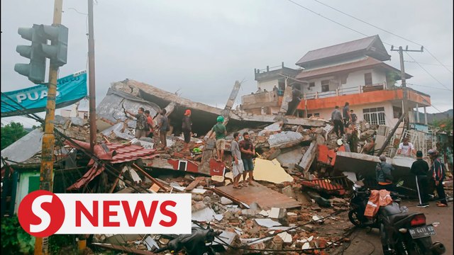 Search underway after strong quake kills at least seven in Indonesia