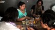 Indian transgender hijra lunches after a routine day of work