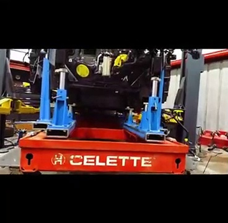 BMW I3 collision damage repair on a Celette car frame machine at LA collision center