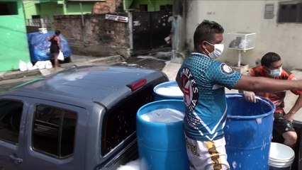 Manaus residents wash city's streets to fight Covid-19