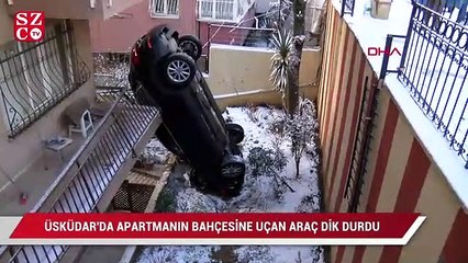 Üç metre yükseklikten apartmanın bahçesine saplandı