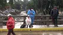 Bolivia river overflows, triggering floods