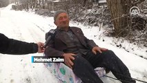 79 yaşındaki Mehmet dedenin 'motosikletli kızak' keyfi