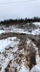 Man Flies Over ATV Handlebars After Hitting Mud Hole
