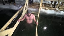 Russians brave icy waters for an Epiphany dip