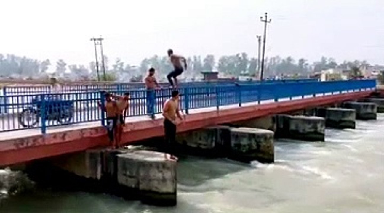 Boys Jumping From Ganga Canal