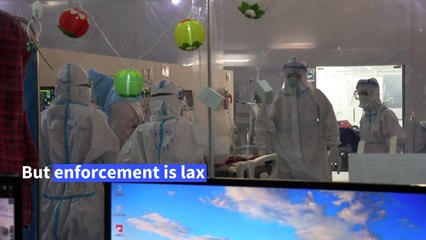 Fighting COVID-19 at Myanmar's stadium-turned-hospital