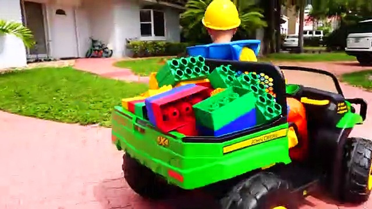 Vlad and_Nikita_Ride_on_Toy_Sports_Car_&_play_with_colored_toy_blocks