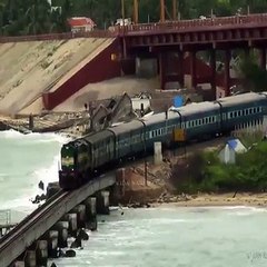train running on open bridge