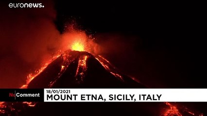 Italy's Mount Etna spews rocks and lava in volcanic explosions