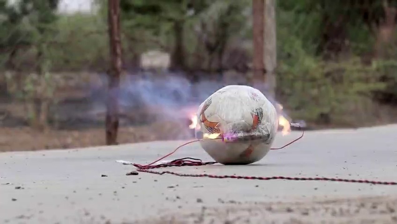 Rockets_On_Football_-_Will_It_Spin_Experiment, 4 rockets on 4 side of football what will happen will it fly aur spin? Comment it