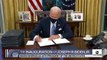 President Biden signs flurry of executive orders on 1st day