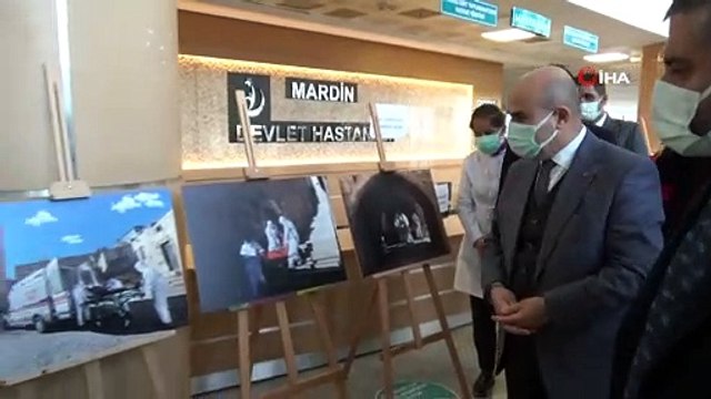 Sağlık çalışanlarının korona virüs mücadelesi fotoğraflara yansıdı