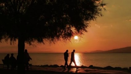 People Heading Home as the Sun Sets