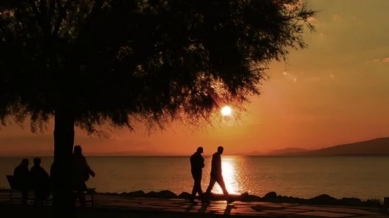 People Heading Home as the Sun Sets