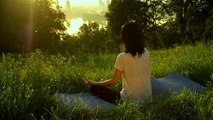 Girl Practicing Yoga Peacefully in the Garden Alone