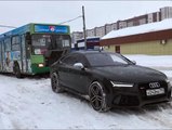 VÍDEO: Un Audi RS 7 de 600 CV saca de la NIEVE a un AUTOBÚS atrapado