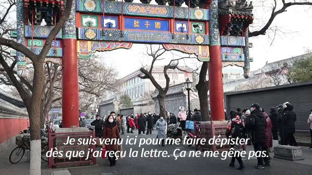Pékin: longues files d'attentes au lancement d'un dépistage massif après quelques cas de Covid