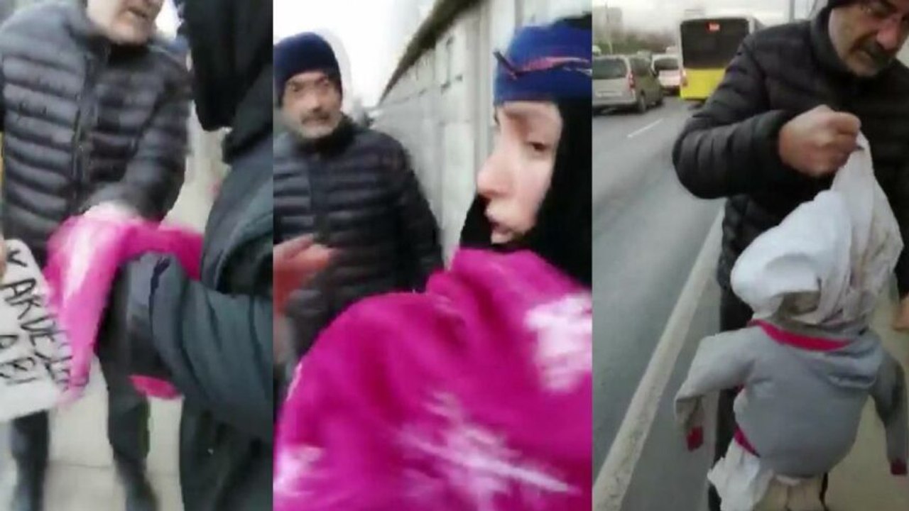 'Kardeşler aç abi' pankartıyla dilenen kadının kucağından bez bebek çıktı