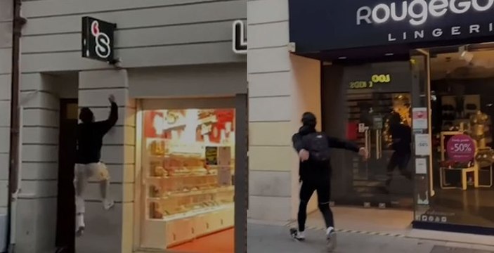 Des jeunes écolos adeptes de parkour s'amusent à éteindre les lumières des vitrines de boutiques