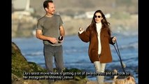 Lily Collins & Fiance Charlie McDowell Walk the Beach with Their Dog