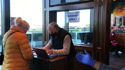 The first day of Covid vaccinations at Bradley's Bar in AFC Fylde's ground