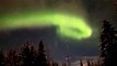 Northern lights hover above Alaska early morning