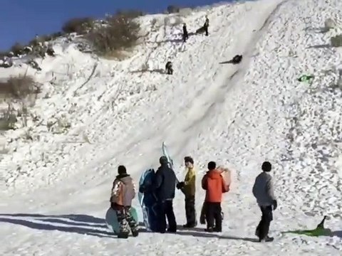 Face Meets Snow in Slow Motion Sledding
