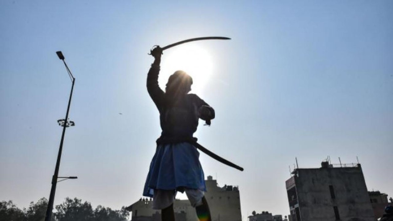 Situation tense as farmers try to attack police with swords