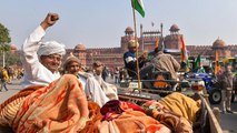 Watch: Farmers reach Red Fort, hoist flags