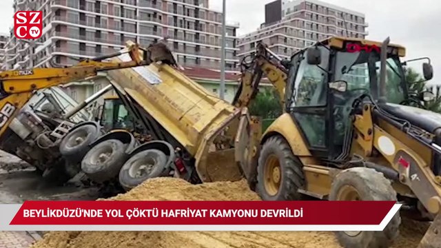 Beylikdüzü'nde yol çöktü, hafriyat kamyonu devrildi