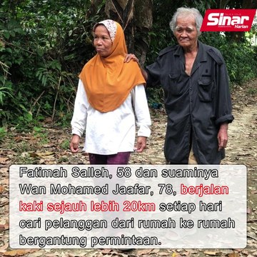 Jadi 'tongkat' suami buta jalan kaki 20km cari rezeki
