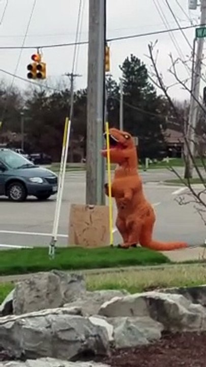 Happy T-Rex Dances at Intersection
