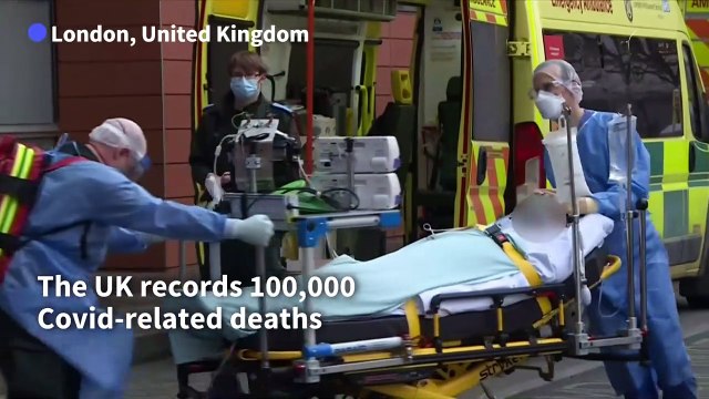 Johnson takes 'full responsibility' as UK deaths top 100,000