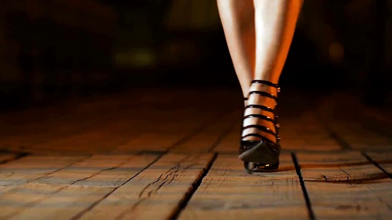 Girl Strutting Forward in Stylish High Heel Sandals