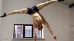 Guy Showcases Talent by Performing Amazing Handstand Tricks on Vertical Bar