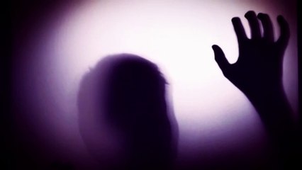 Intriguing Silhouette of a Kid Behind the Door