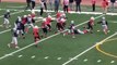 Boy Pushes Defender With Stiff Arm And Scores During Football Match