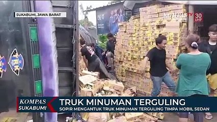 Tải video: Sopir Mengantuk Truk Minuman Terguling Timpa Mobil Sedan