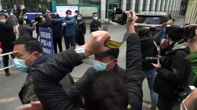Expertos de la OMS comienzan finalmente en Wuhan su misión en el terreno