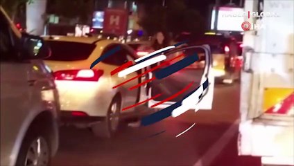 Trafikte sıkılan genç kız araçtan inip dans etti