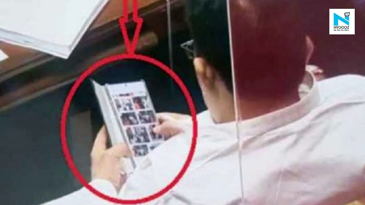 Congress leader Prakash Rathod caught watching...