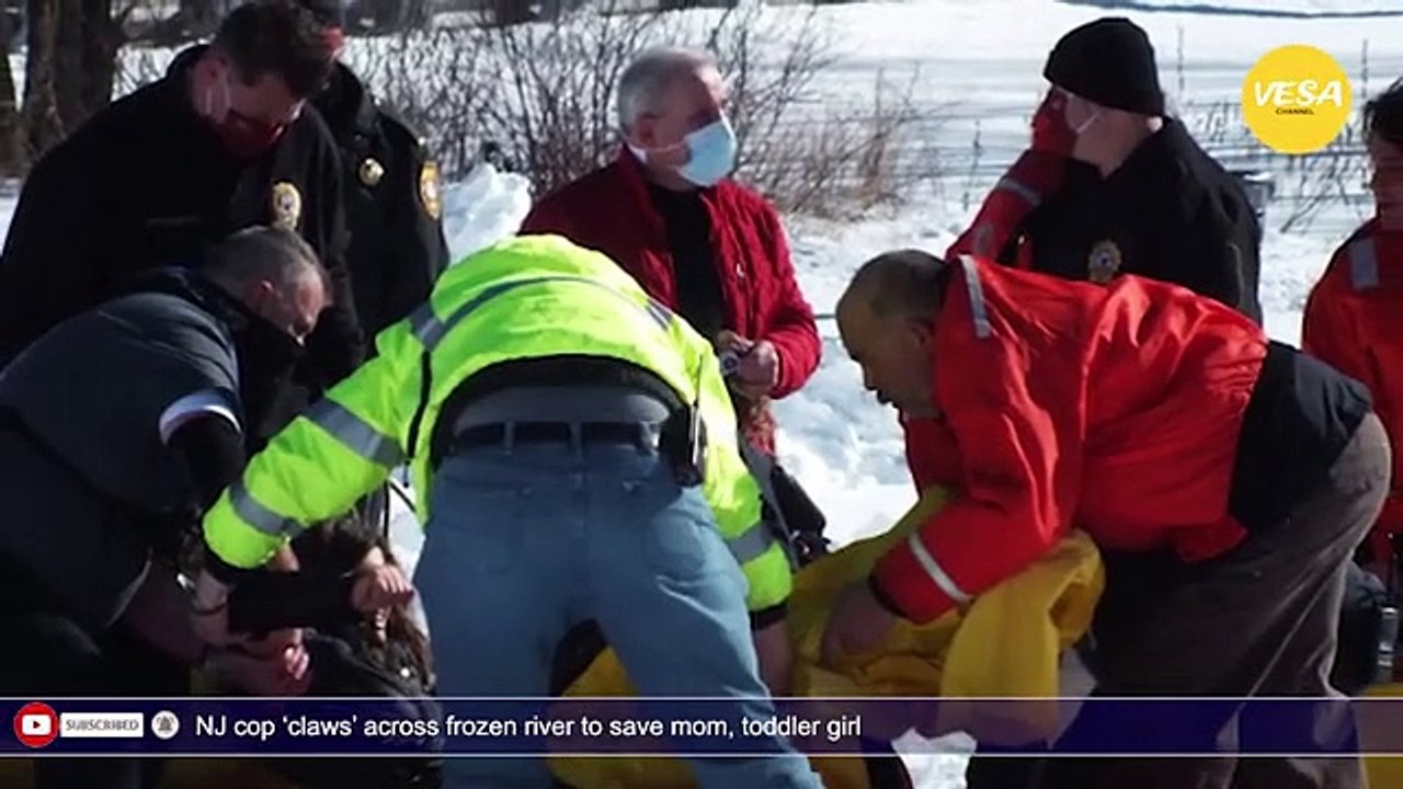 NJ cop claws across frozen river to save mom, toddler girl