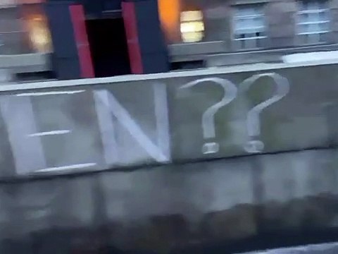 LGBT community members remove graffiti