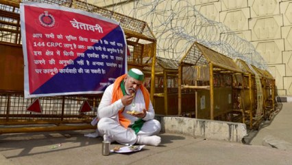 Rakesh Tikait spotted sitting on road and eating food