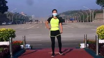 Elle danse alors que l'armée se prépare à un coup d'Etat derrière elle